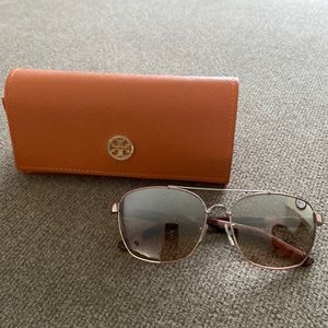 Nearly new Tory Burch rose gold shiny sunglasses 57 mm with Tory Burch case.